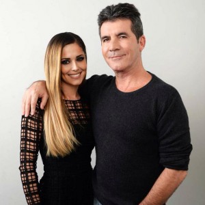 Cheryl reunited with Simon (Facebook)